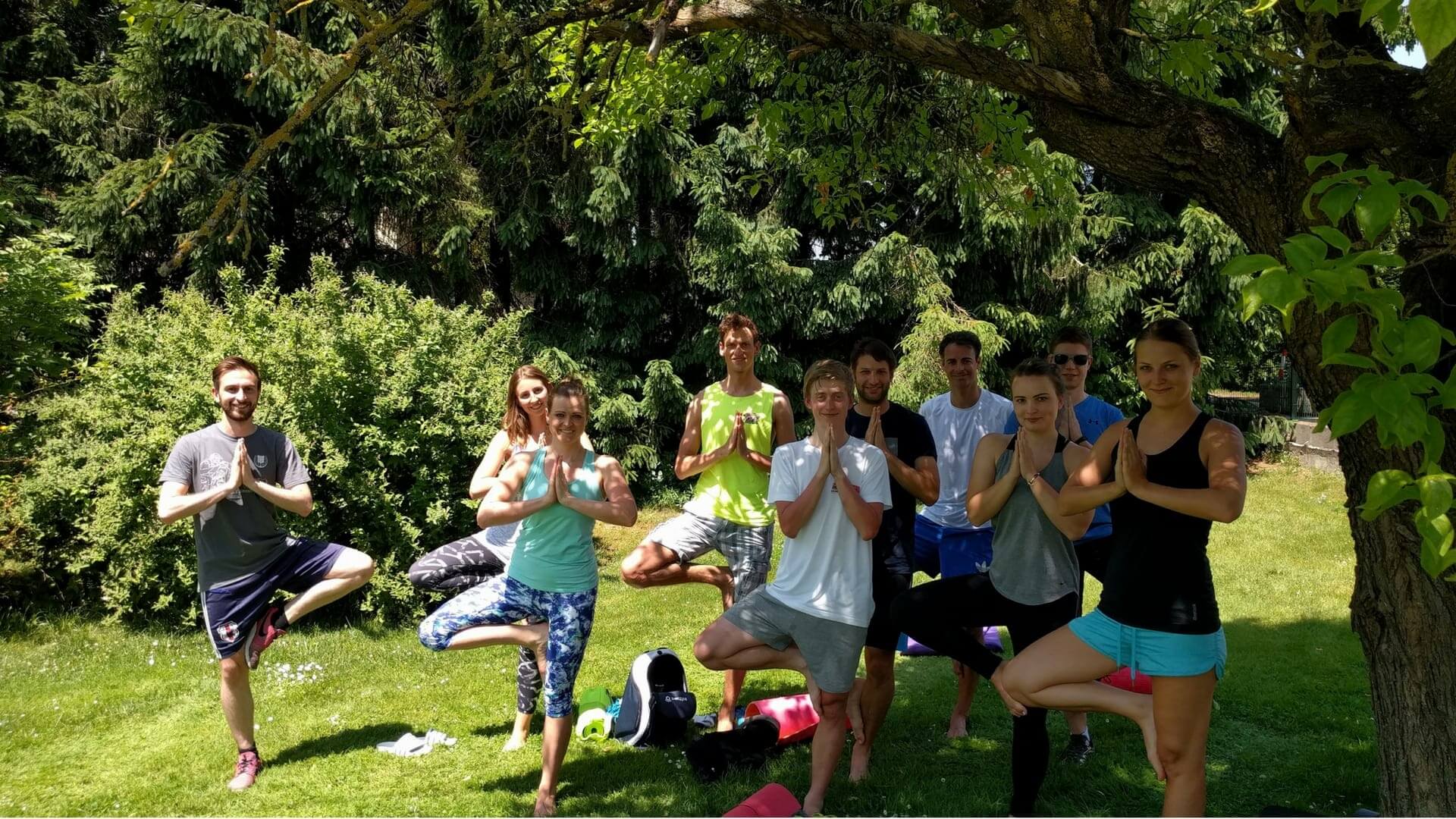 Tractive employees doing yoga outdoors