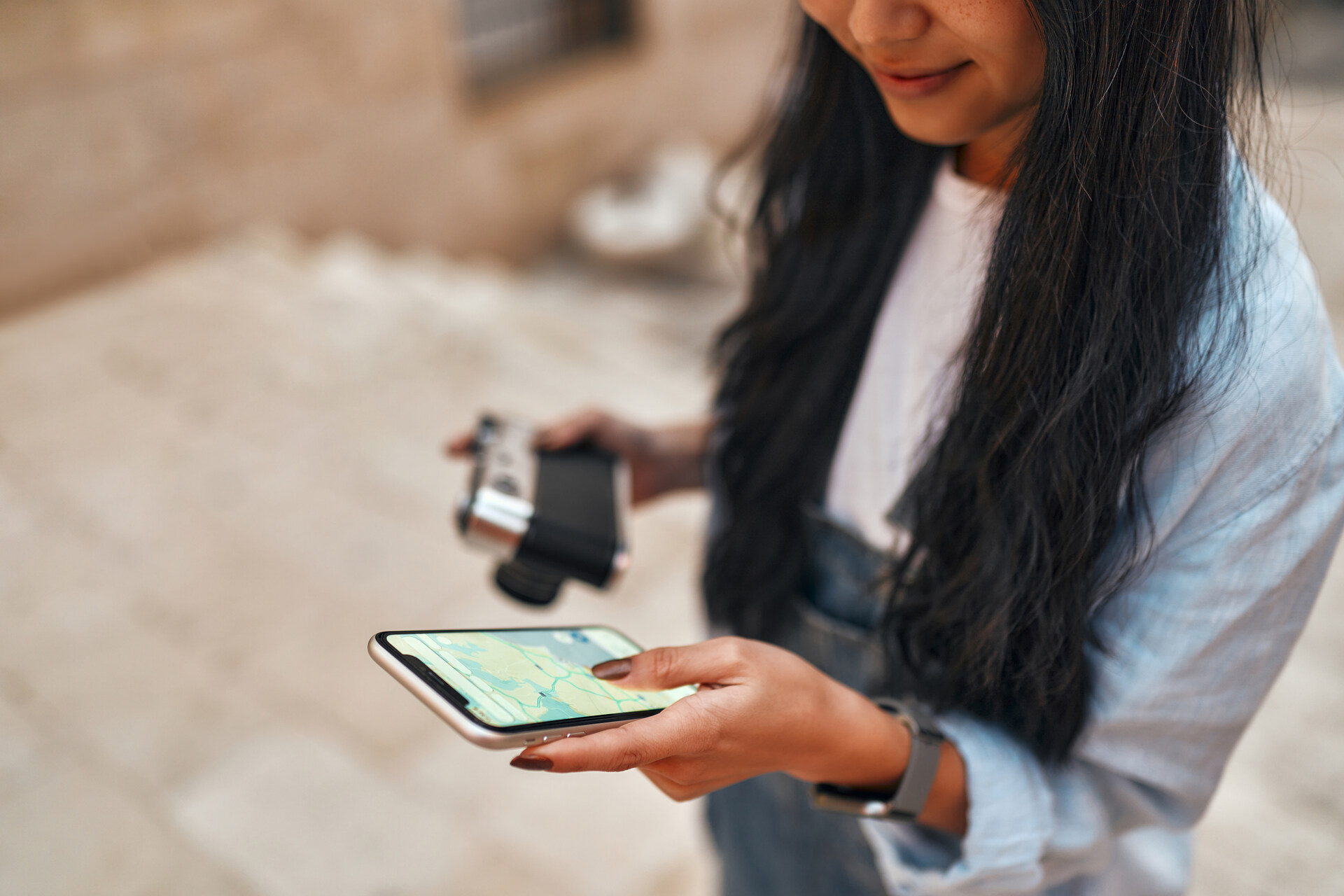 A woman checking her smartphone